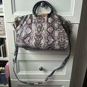 Beautiful Christian Siriano soft snake skin handbag . used twice